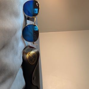 Ray Bans blue and gold sunglasses.